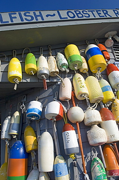 Buoys hanging on building