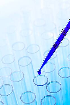 Blue liquid in pipette and test tubes