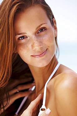 Portrait of young woman in bikini