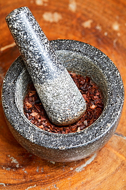 Mortar and pestle with crushed cacao