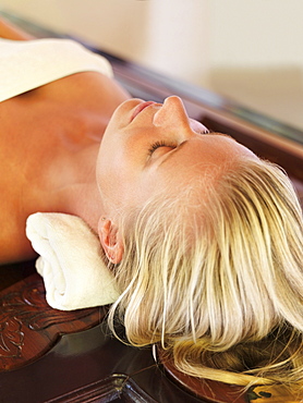 Woman relaxing in spa