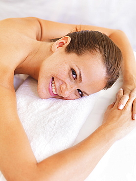 Woman relaxing in spa