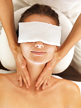 Woman receiving massage in spa