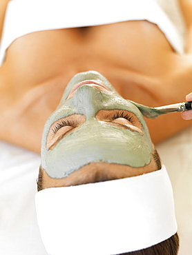 Woman receiving face spa therapy