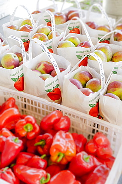 Apples and red peppers ready to be bought