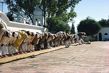 Men praying at mosque, Peshawar, Pakistan, Asia