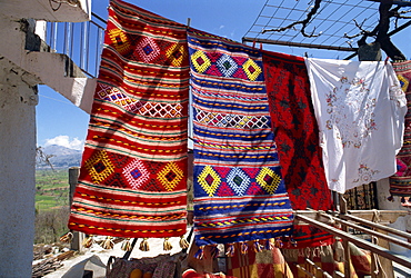 Textiles for sale in village near Lasithi Plateau, Crete, Greek Islands, Greece, Europe