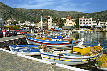 Fishing boats moored in the harbour at Elounda, near Agios Nikolas, Crete, Greece, Europe