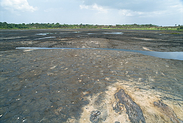 The world's largest natural pitch lake, 90 meters deep, Trinidad, West Indies, Caribbean, Central America