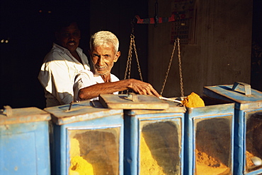 Elderly man at snack stall, Negombo, Sri Lanka, Asia