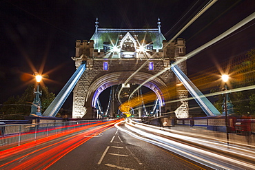 Long exposure of traffic over Tower Bridge at dusk, London, England, United Kingdom, Europe