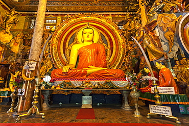 Large Buddhist statue at Gangaramaya Temple, Colombo, Sri Lanka, Asia 