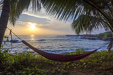 Silhoutte of an empty beach hammock at the beach, Tangalle, Sri Lanka, Asia 