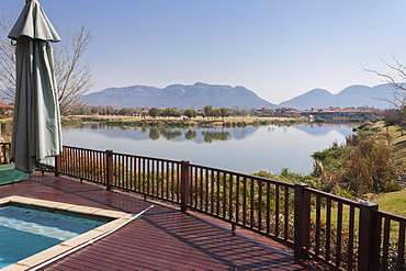 The view across the lake in Pecanwood Estate, an affluent gated community in Hartbeespoort, North West Province, South Africa, Africa