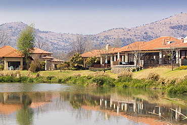 The view across the lake in Pecanwood Estate, an affluent gated community in Hartbeespoort, North West Province, South Africa, Africa