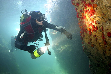 Diver in caves. UK   (RR)