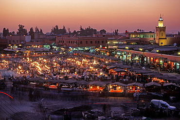 Place Djemaa El Fna at dusk, Marrakesh, Morocco.