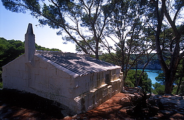 Disused house in Menorca above Cala Mitjana, Menorca, Spain