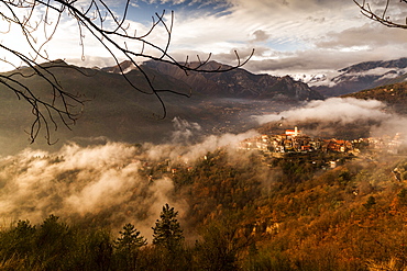 Village of La Bollene Vesubie in the evening mist in the Maritime Alps (Alpes Maritimes), France, Europe