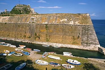 Boats moored below the Old Fort, Corfu, Ionian Islands, Greek Islands, Greece, Europe