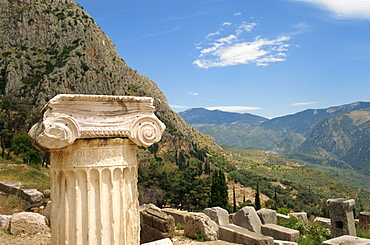 Close-up of capital on a column with hills in the background, at Delphi, UNESCO World Heritage Site, Greece, Europe