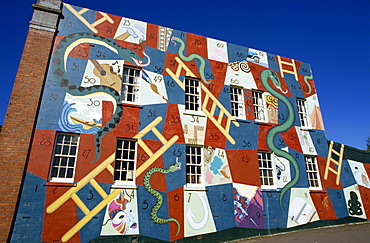 The game of snakes and ladders painted on a wall of a house in Auckland, New Zealand, Australasia, Pacific