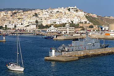 Warship moored in the harbour and the old town behind, Tangier, Morocco, North Africa, Africa