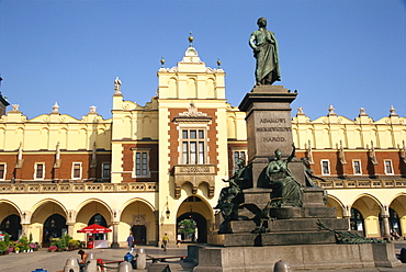 Statue of Adam Mickiewicz in front of the Cloth Hall on the Main Square in Krakow, Malopolska, Poland, Europe