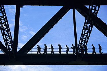 Bridge climb participants in silhouette, Sydney Harbour Bridge, Sydney, New South Wales, Australia, Pacific