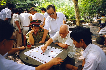 Men playing Chinese chess, Shanghai, China