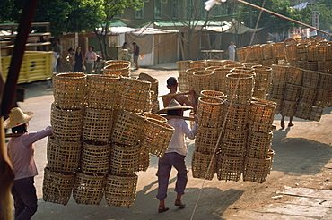 People carrying baskets, China, Asia