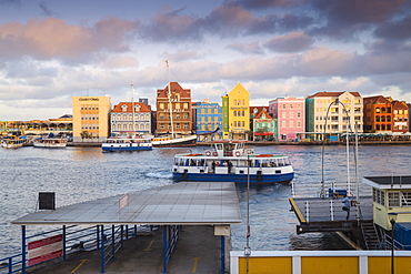 View of Otrobanda ferry terminal and Dutch colonial buildings on Handelskade along Punda's waterfront, UNESCO World Heritage Site, Willemstad, Curacao, West Indies, Lesser Antilles, former Netherlands Antilles, Caribbean, Central America