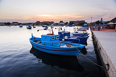 Fishing boats at sunset in Marzamemi fishing harbour, South East Sicily, Italy, Mediterranean, Europe 