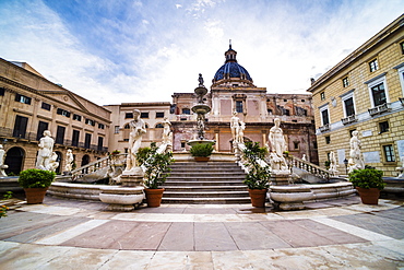 Pretoria Fountain in Piazza Pretoria (Pretoria Square) with dome of Church of Santa Caterina, Palermo, Sicily, Italy, Europe 