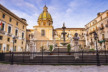 Pretoria Fountain in Piazza Pretoria with the dome of Church of San Giuseppe dei Teatini, Palermo, Sicily, Italy, Europe 