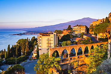 Sunrise hitting the top of Mount Etna volcano, Taormina, East Coast of Sicily, Italy, Mediterranean, Europe e