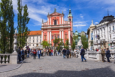 Franciscan Church of the Annunciation and bridge over the Ljubljanica River, Ljubljana, Slovenia, Europe