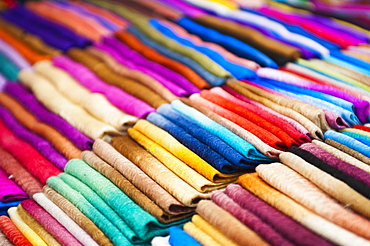 Traditional silk scarves of northern Thailand at the night market, Chiang Rai, Thailand, Southeast Asia, Asia