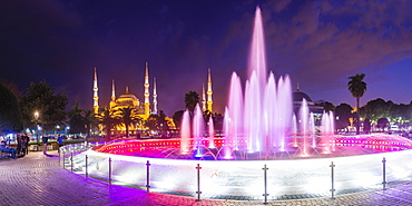 Blue Mosque (Sultan Ahmed Mosque), UNESCO World Heritage Site, and Sultanahmet Square fountain at night, Istanbul, Turkey, Europe