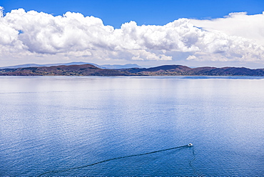 Boat tour on Lake Titicaca, seen from Taquile Island, Peru, South America