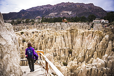 Tourist exploring Valle de la Luna (Valley of the Moon), La Paz, La Paz Department, Bolivia, South America