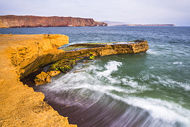 Desert directly meeting the sea (Pacific Ocean), Paracas National Reserve (Reserva Nacional de Paracas), Ica, Peru, South America