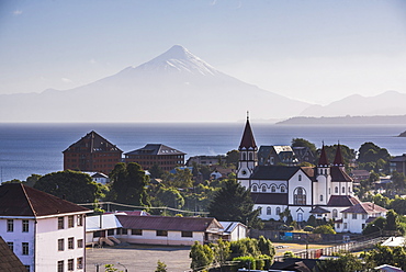 Sacred Heart of Jesus Catholic Church (Iglesia Sagrado Corazon de Jesus) with Llanquihue Lake and Osorno Volcano behind, Puerto Varas, Chile Lake District, Chile, South America