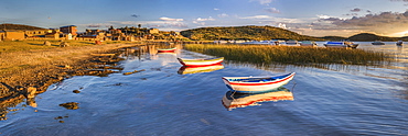 Sunrise in the harbour at Challapampa village, Isla del Sol (Island of the Sun), Lake Titicaca, Bolivia, South America