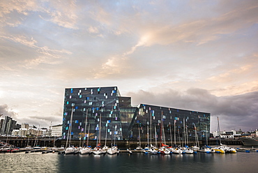 Harpa Concert Hall and Conference Centre and boats in Reykjavik Harbour at sunrise, Iceland, Polar Regions