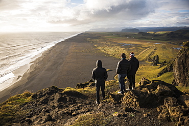 Tourists looking at the view at sunset from Dyrholaey Peninsula, near Vik, South Iceland (Sudurland), Iceland, Polar Regions