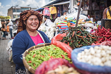 Portrait of a market stall owner in Berastagi (Brastagi) Market, North Sumatra, Indonesia, Southeast Asia, Asia