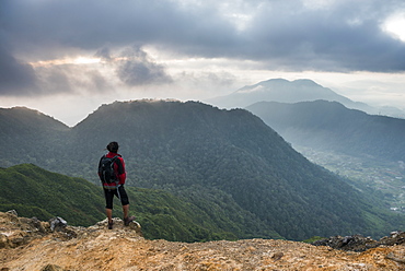 Tourist at the top of Sibayak Volcano at sunrise, Berastagi (Brastagi), North Sumatra, Indonesia, Southeast Asia, Asia