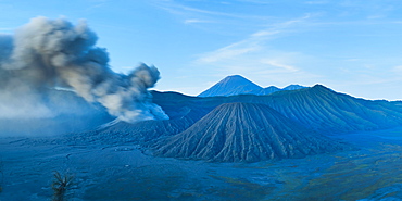 Mount Bromo volcano erupting before sunrise, East Java, Indonesia, Southeast Asia, Asia