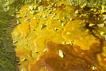 Liquid sulphur solidifying on the ground at Kawah Ijen, Java, Indonesia, Southeast Asia, Asia